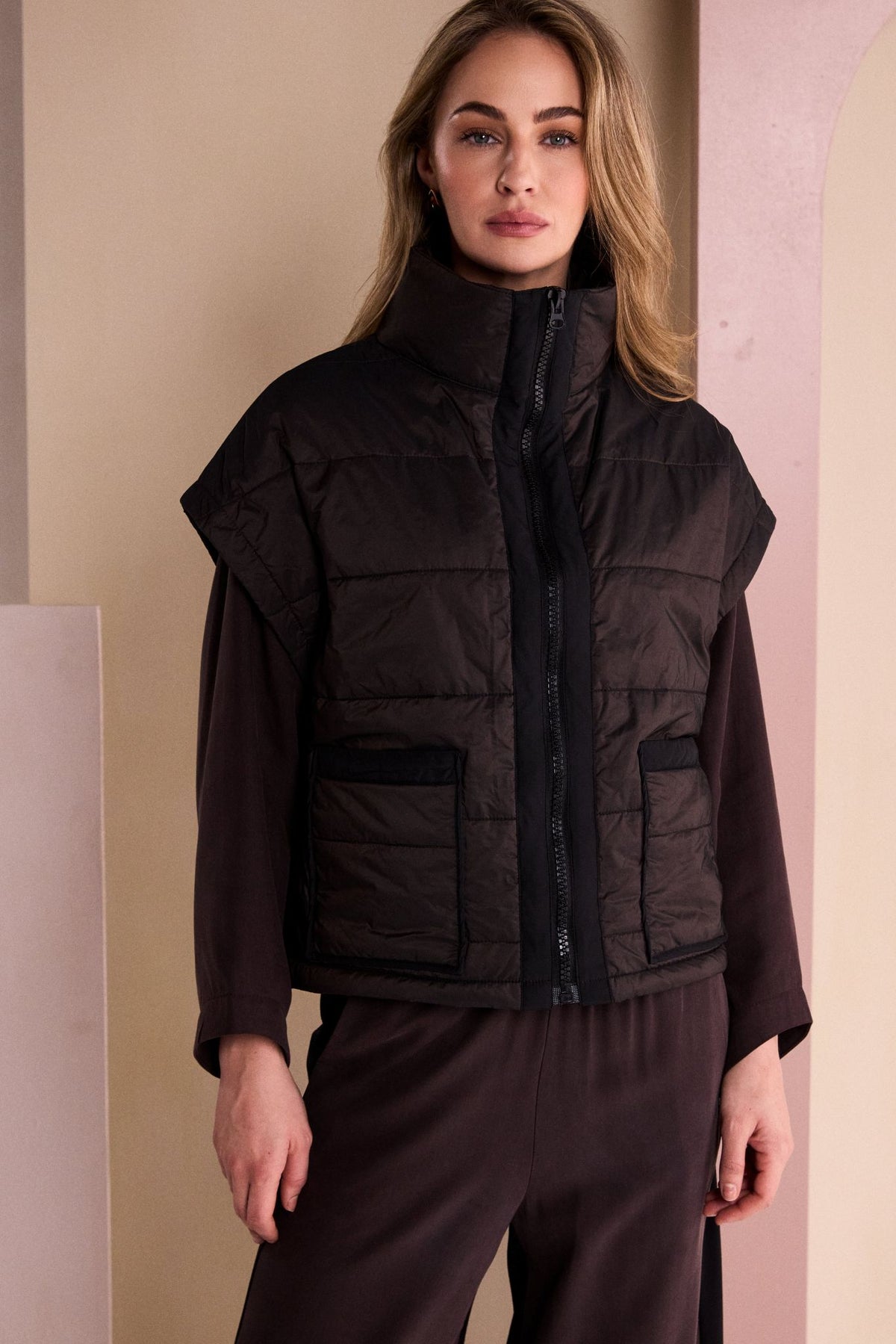 Naya Padded Short Waistcoat With Contrast Zip And Pocket Binding