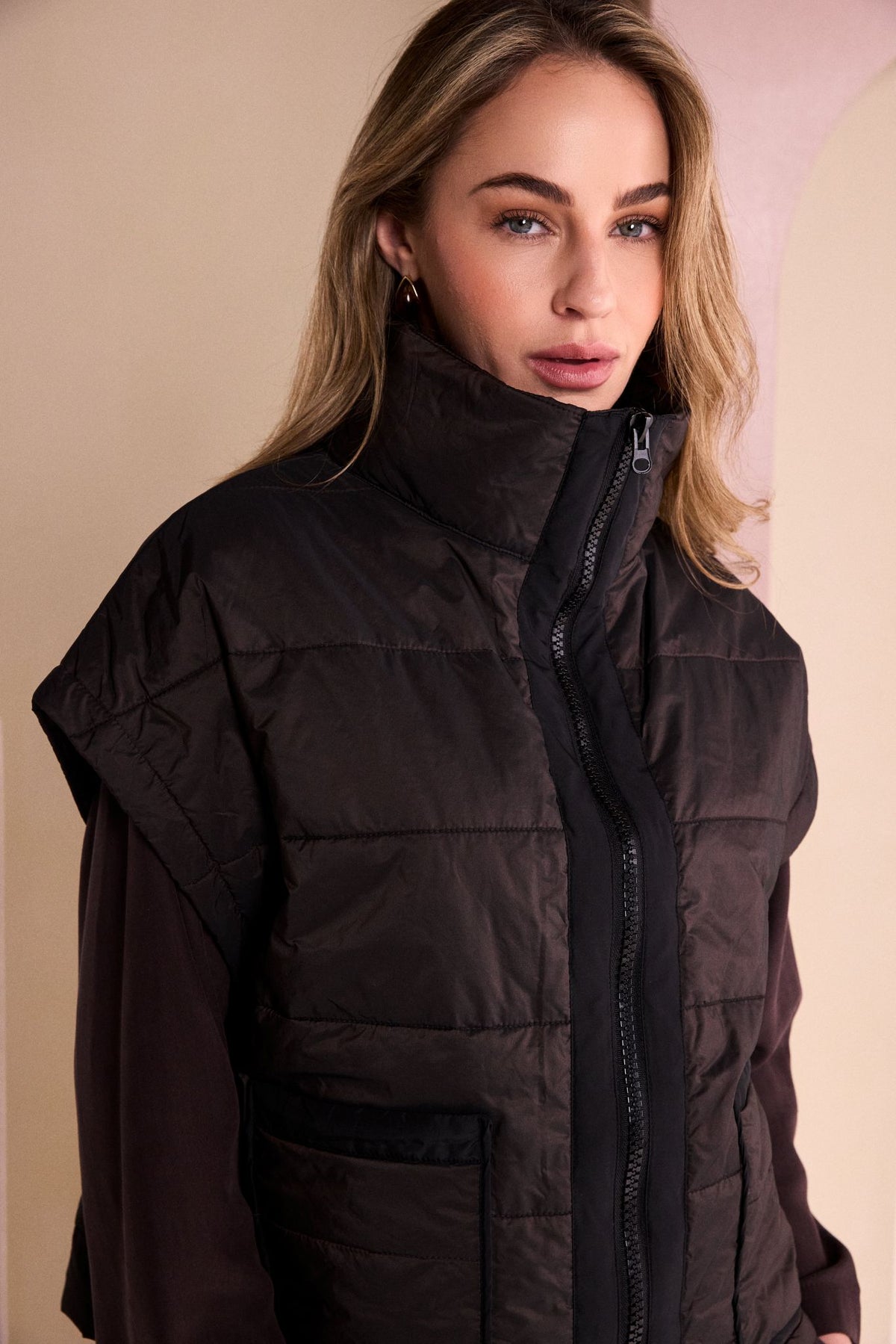 Naya Padded Short Waistcoat With Contrast Zip And Pocket Binding